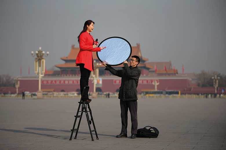 A reporter at work in Beijing, China