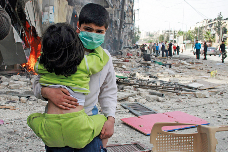 Boy carries girl, Bustan al-Qasr, Aleppo, Syria, 2014