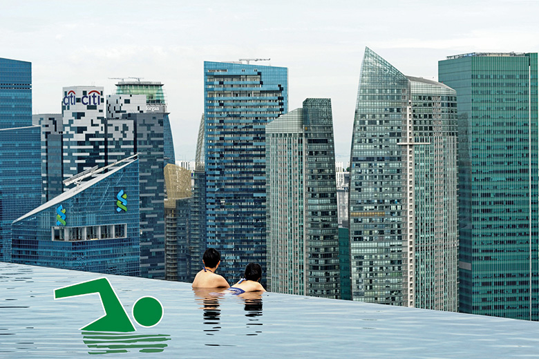 Green man swimming in pool above city skyline