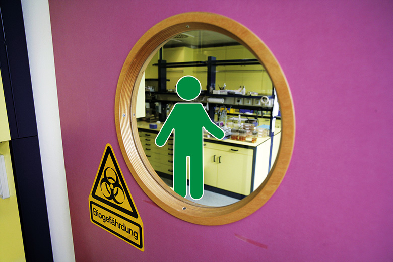 Green man working in a laboratory