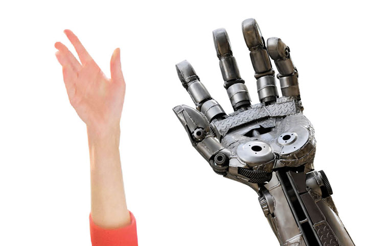 Human hand next to robot hand