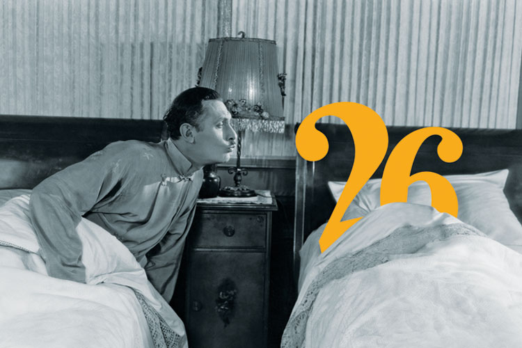 Man kissing number twenty-six in bed