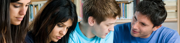 Four students working at desk