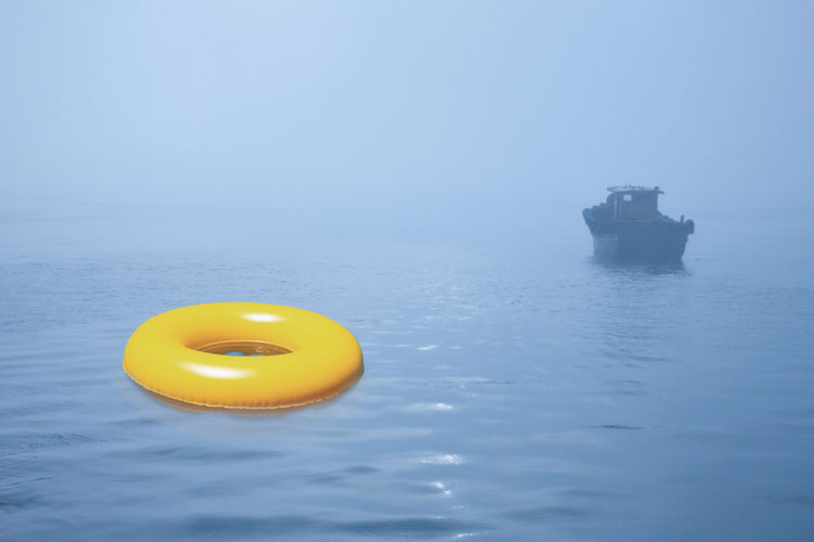 Rubber ring floating in misty waters