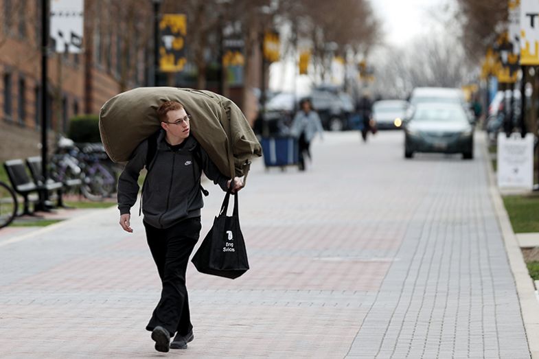 Student carrying belongings