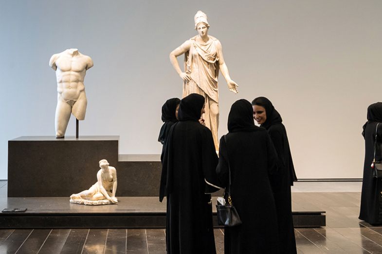 Women in Louvre Abu Dhabi Museum