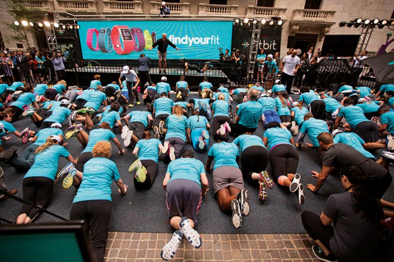 A workout outside the New York Stock Exchange after Fitbit’s initial public offering 