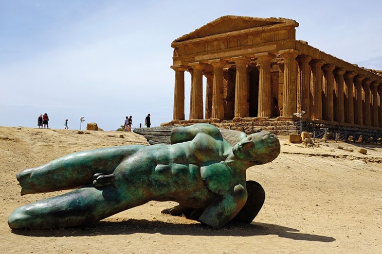 Sculpture of the fallen Icarus (2011) by the contemporary Polish artist, Igor Mitoraj, at the Temple of Concord in Agrigento