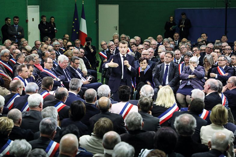 French president Emmanuel Macron addresses a gathering of some 600 mayors in the Normandy city of Grand Bourgtheroulde