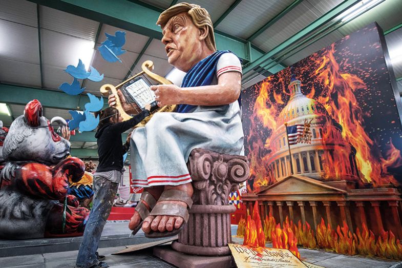 US President Donald Trump as the harp-playing Emperor Nero in front of a burning White House