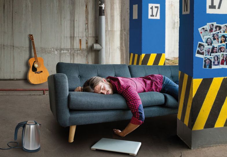 Montage of a person asleep on sofa in an empty car park