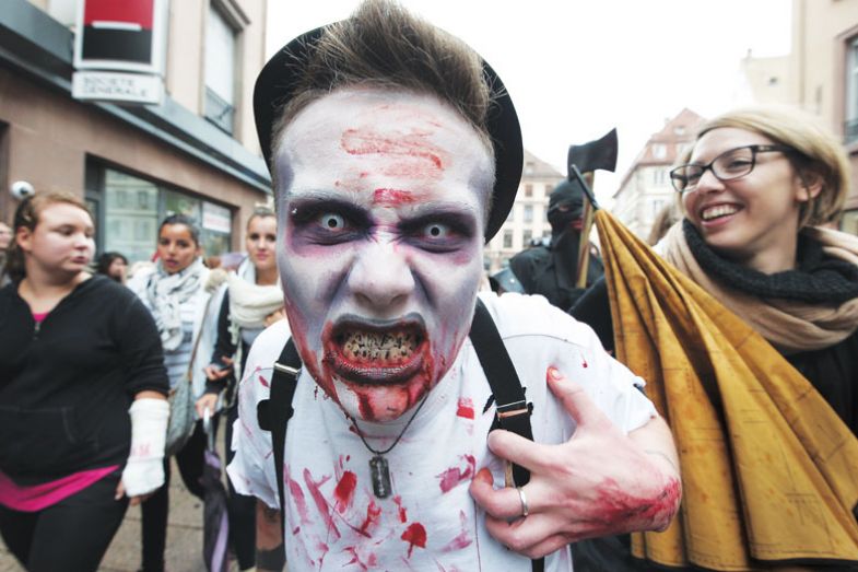  man dressed as a zombie takes part in a Zombie Walk for the book  John Smyth’s Toxic University: Zombie Leadership, Academic Rock Stars, and Neoliberal Ideology 