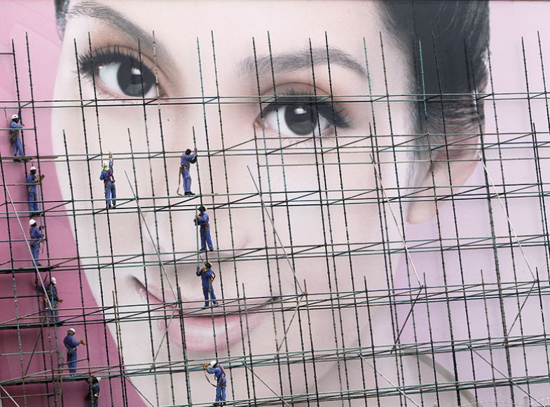 workmen scaffolding female face