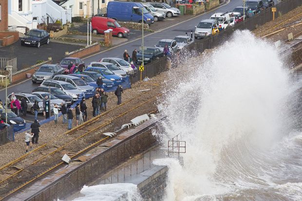 Wave crashing against wall