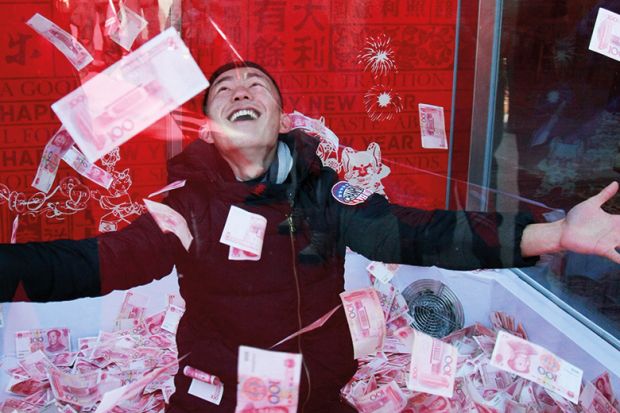 A man surrounded by banknotes