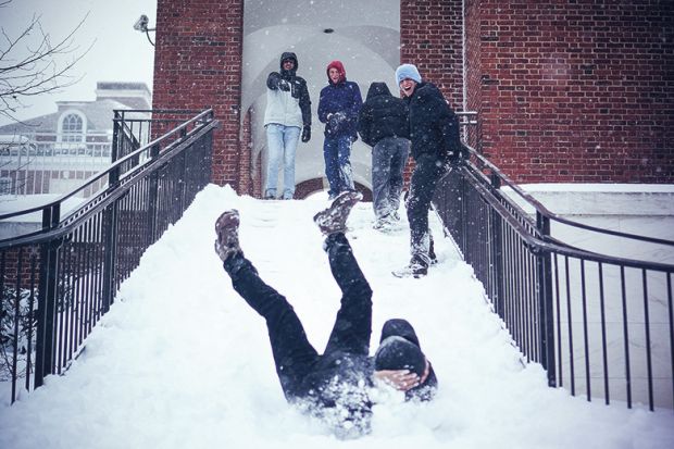 Student slips on snowy staircase, Johns Hopkins University