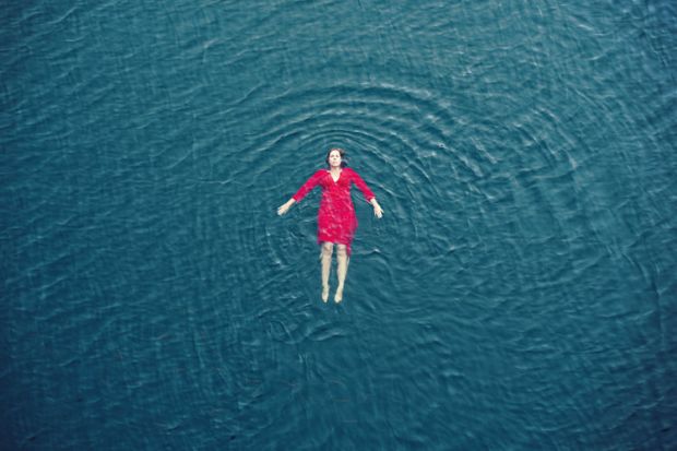 A woman floating in the sea