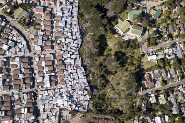 Aerial overhead township and middle class houses in South Africa