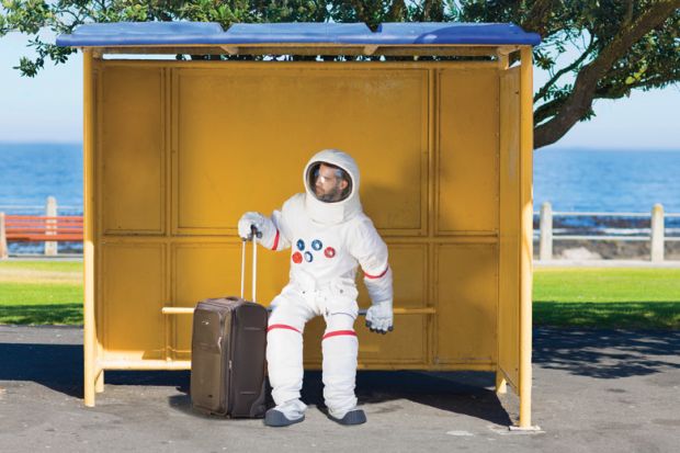 Astronaut waiting with suitcase at bus stop
