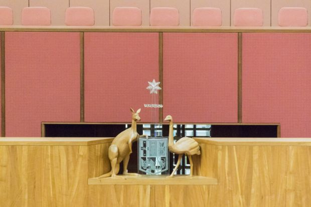Australian coat of arms in the Senate Chamber in Parliament House, Canberra, ACT, Australia