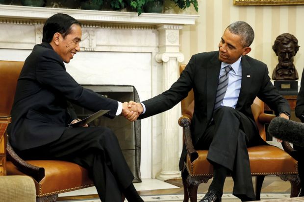 Barack Obama and Joko Widodo shaking hands, Oval Office, White House