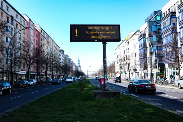 Berlin traffic billboard with health advice during coronavirus shutdown