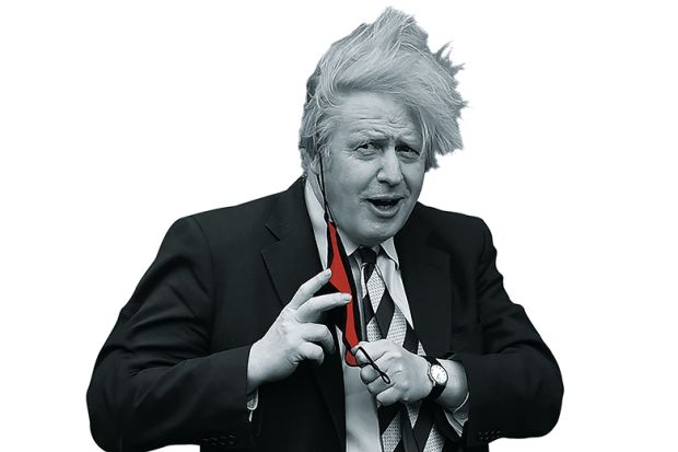 Boris Johnson putting on mask