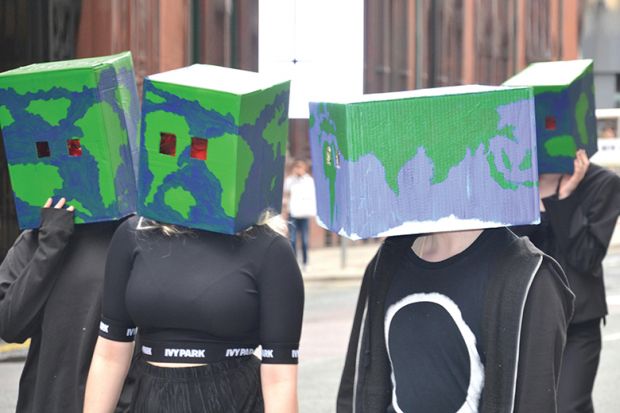 People with boxes on their heads
