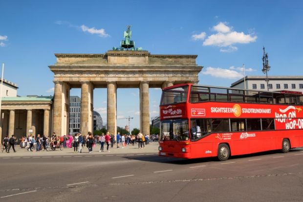 A double-decker bus at the Brandenburg Gate