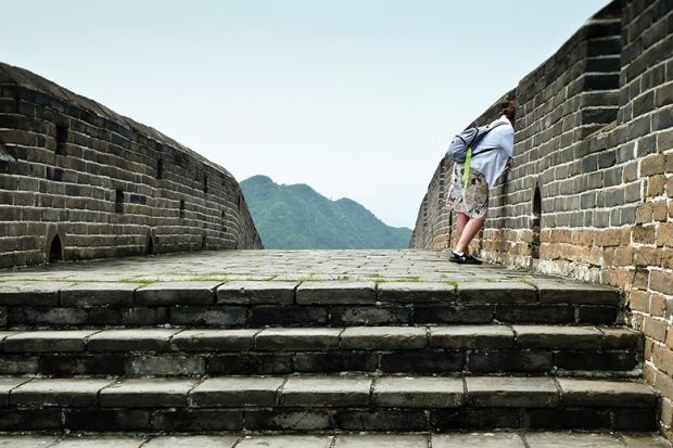 Woman on Great Wall of China