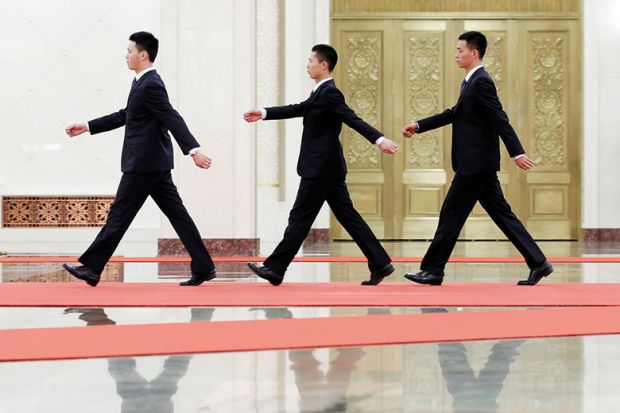 chinese men walking