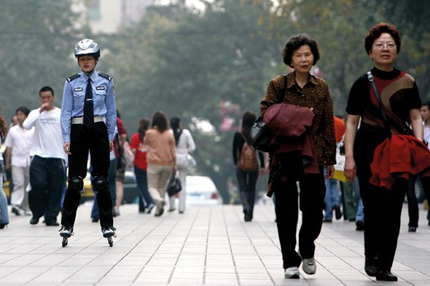 Chinese police officer on rollerblades