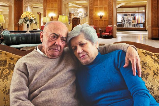 Couple in lobby of Fairmont Chateau Laurier Hotel, Ontario, Canada