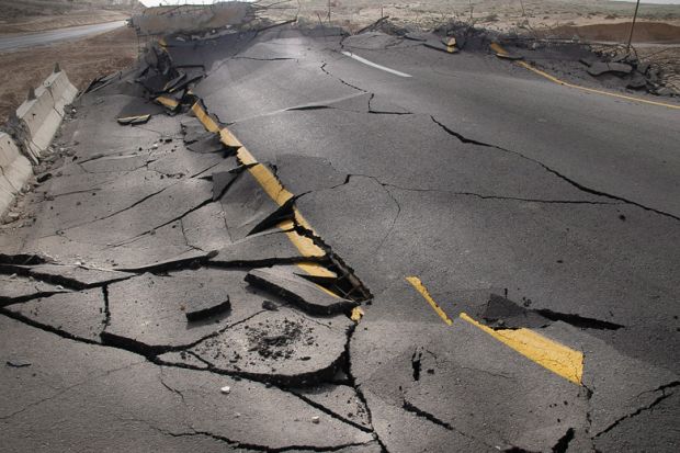 Cracked road damaged by earthquake