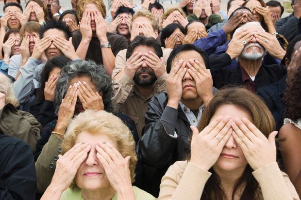 Crowd of people covering eyes