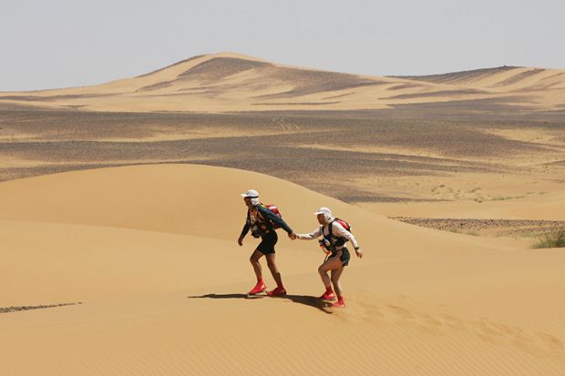 Two people in desert