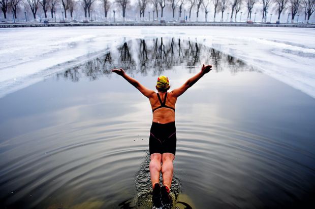 Diving into a cold lake