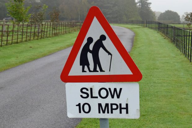 Elderly in the road sign