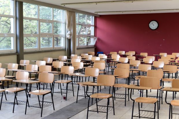 Empty chairs illustrating drop in enrolment at English language school in the UK