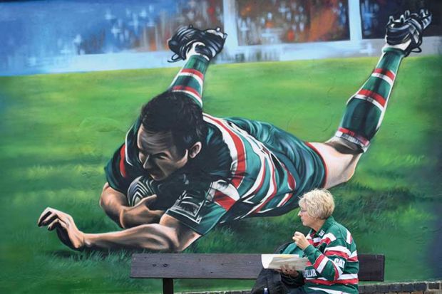 female-rugby-fand-and-mural