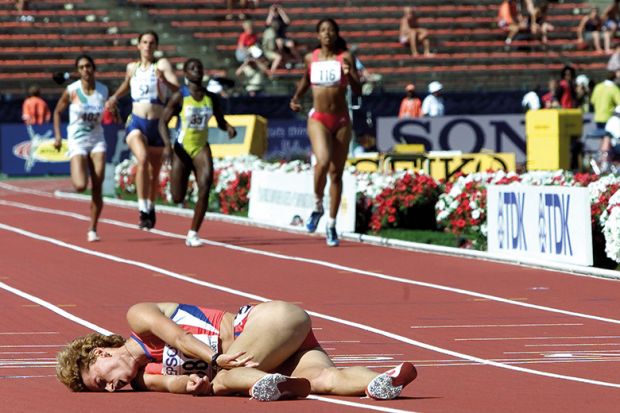 female runner lays on the floor