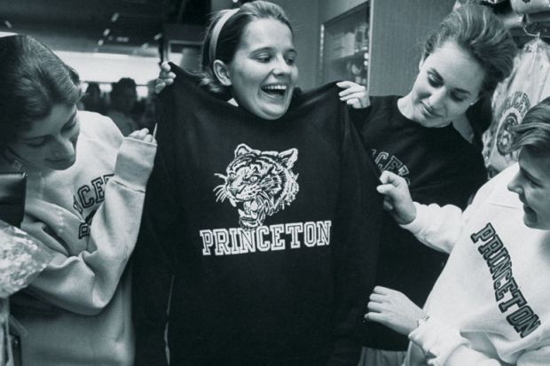 Female students shopping for Princeton University sweatshirts
