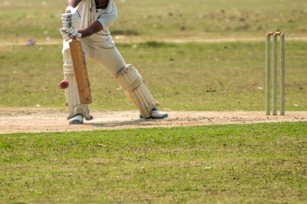 An Indian cricketer plays a defensive shot