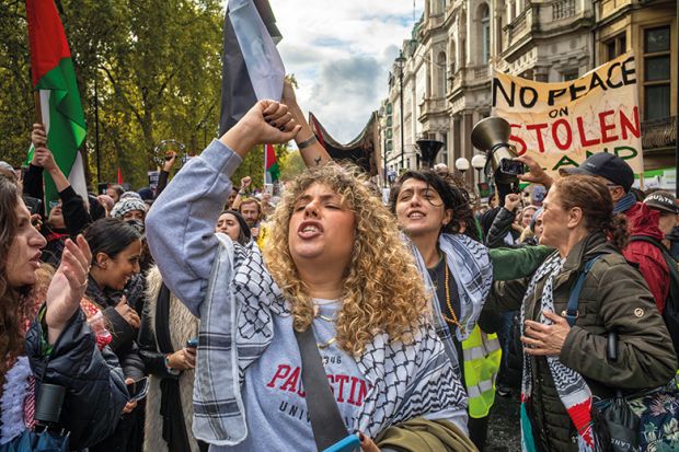 A woman chants at a pro-Palestine protest in London