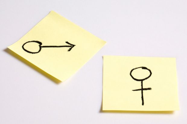 Gender symbols drawn on Post-it notes