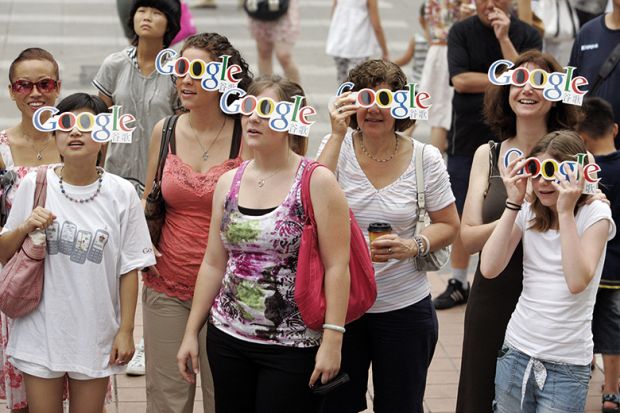 People wearing Google glasses