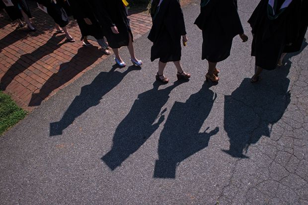 Shadows of graduates at liberal arts college US