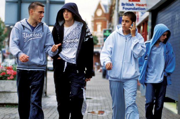 Group of teenage boys walking together in England