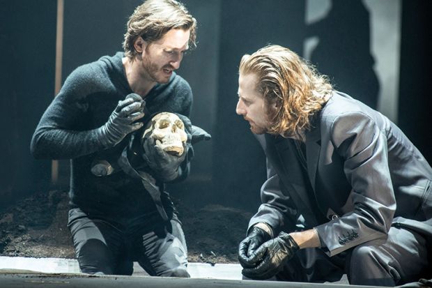Performance of Shakespeare's Hamlet to illustrate Australia's identity crisis, with regards to whether institutions can continue to be called a "university"