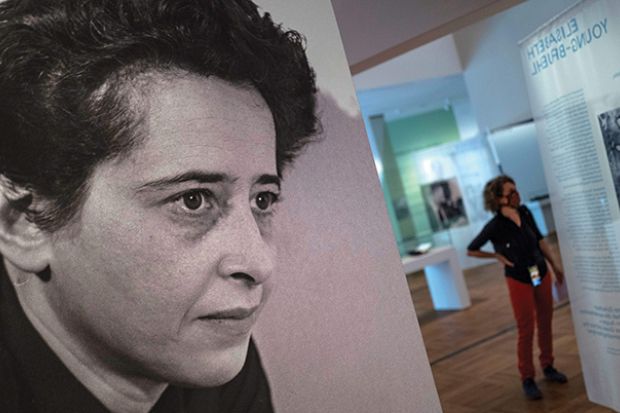 A photograph of German-American philosopher and political theorist Hannah Arendt (L) is on display during a press preview of the exhibition “Hannah Arendt and the Twentieth Century” at the German Historical Museum